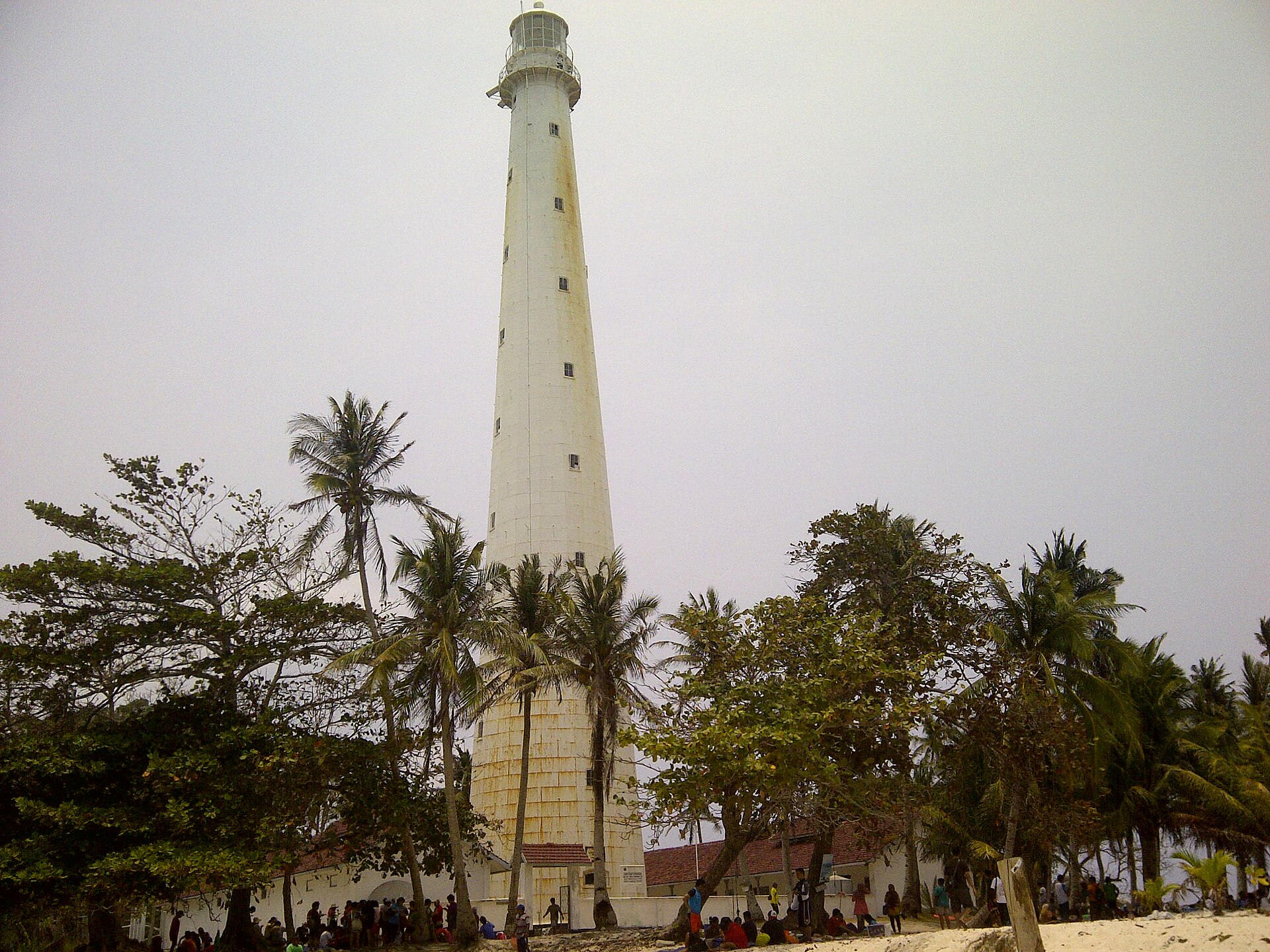 The historic lighthouse on Lengkuas Island, a perfect spot for breathtaking views.