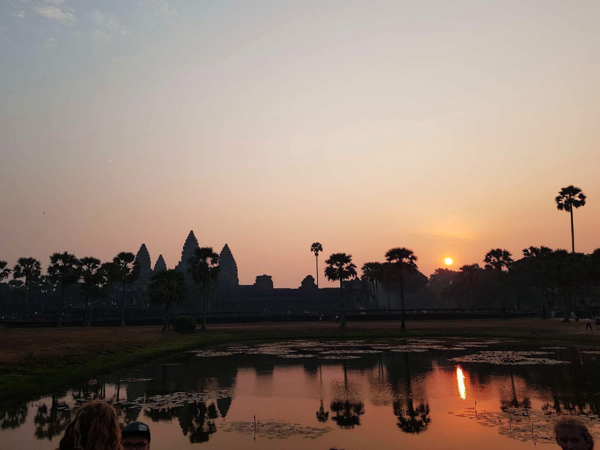 Witnessing the sunrise at Angkor Wat, a breathtaking experience before the crowds arrive.