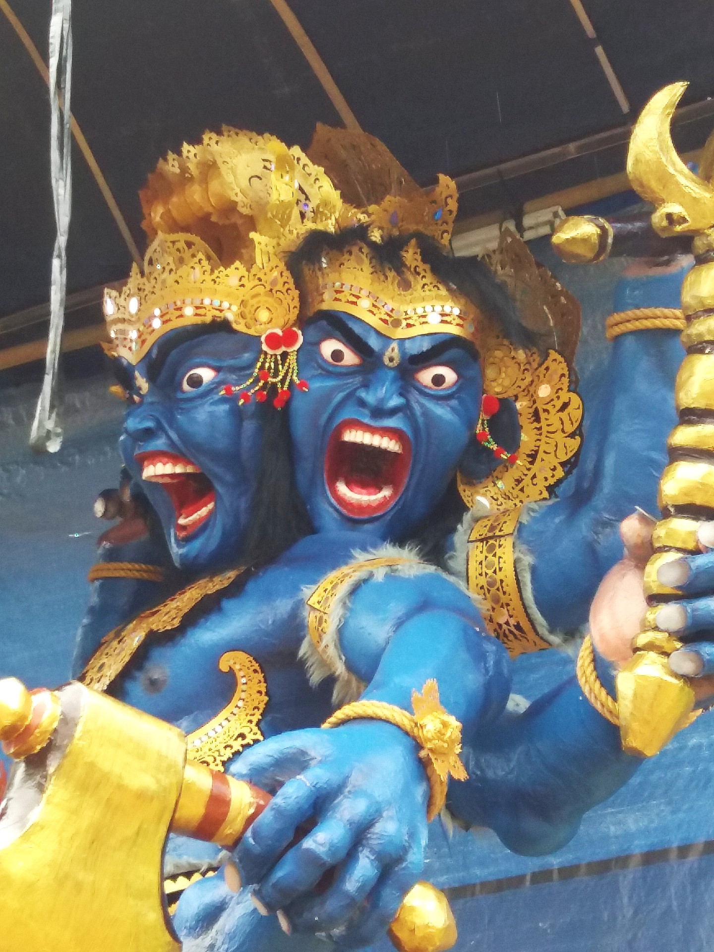 The ogoh-ogoh parade symbolizes the cleansing of negative elements before Nyepi.