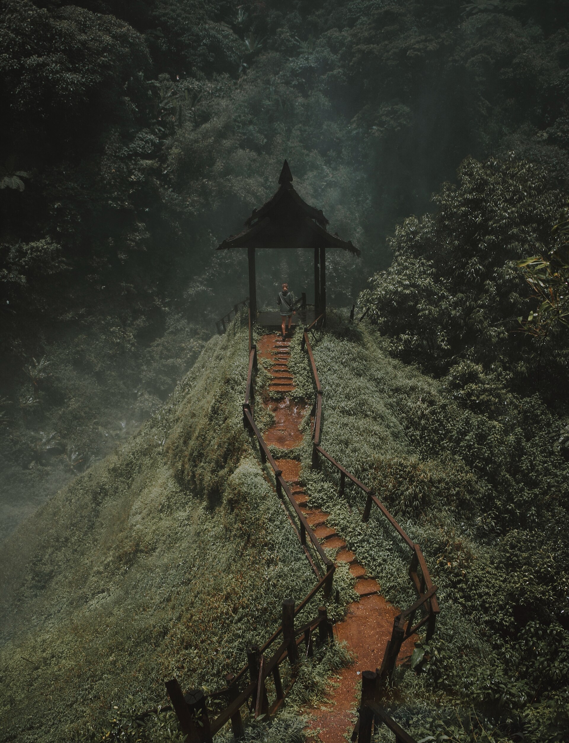 Tad Yuang Waterfall cascades into a serene valley, perfect for hiking and photography.
