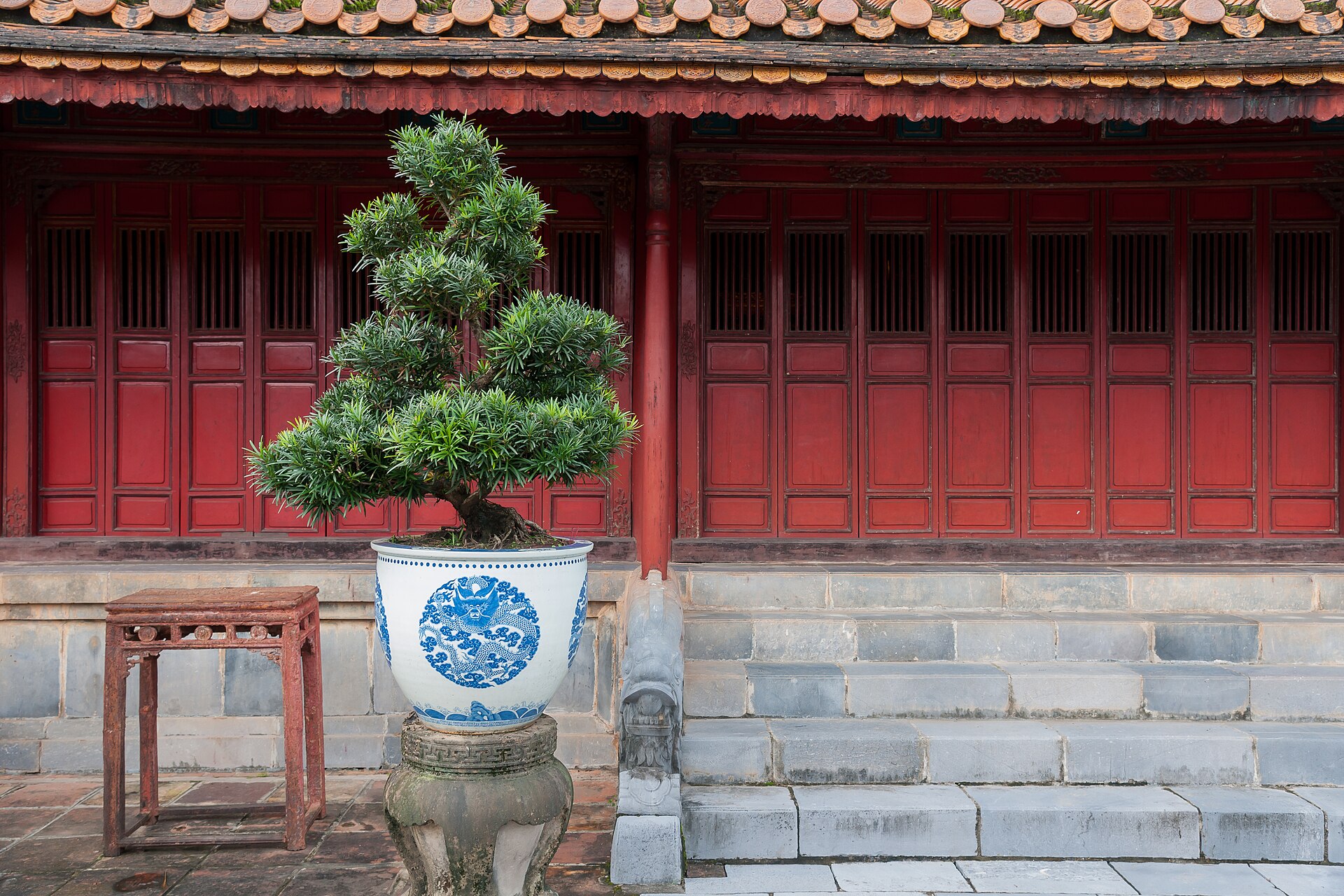 The serene Tomb of Emperor Minh Mang, surrounded by lush gardens and tranquil lakes.