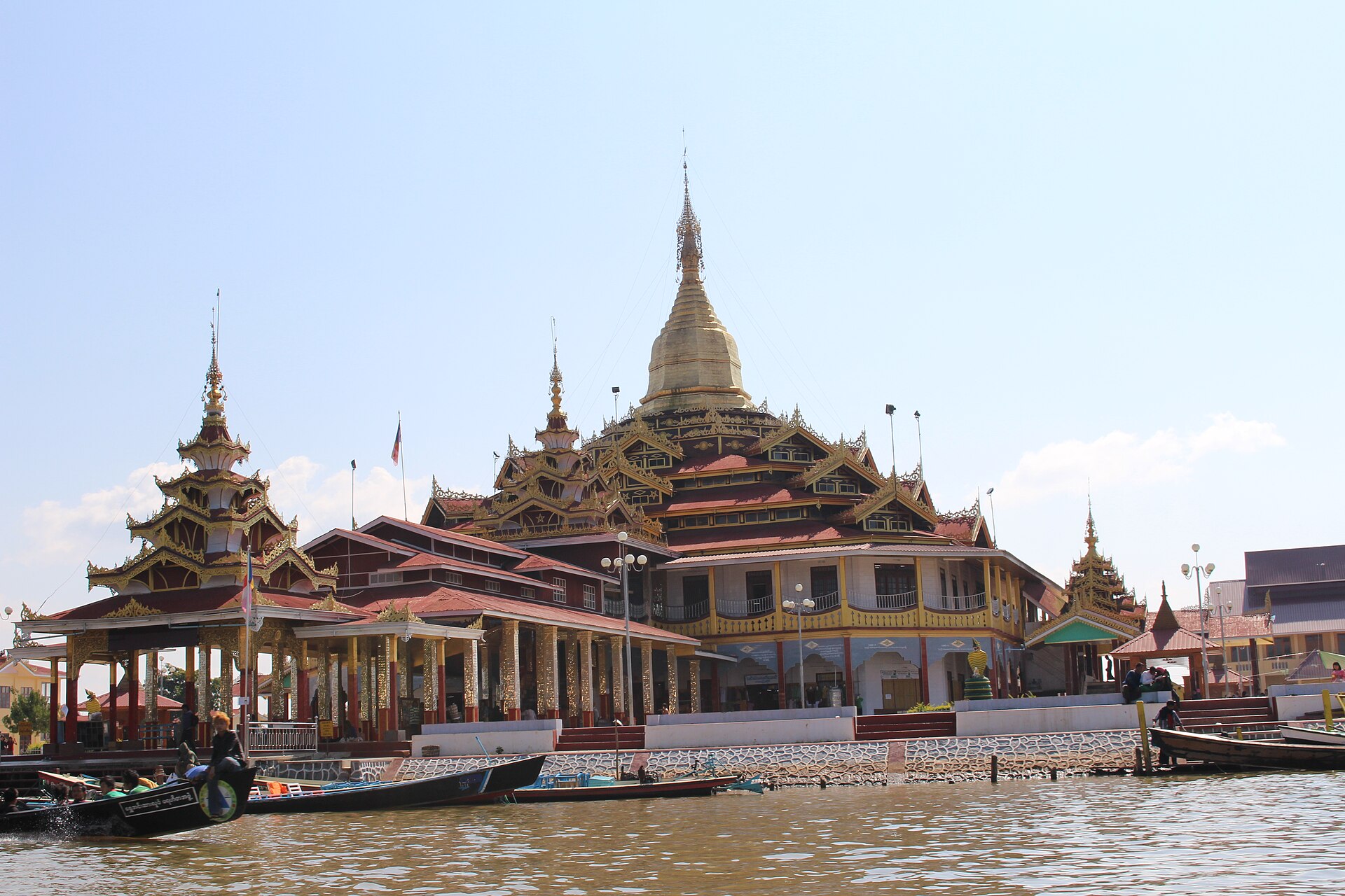 The revered Phaung Daw Oo Pagoda, a spiritual hub for the Intha people, adorned with gold-covered Buddha statues.