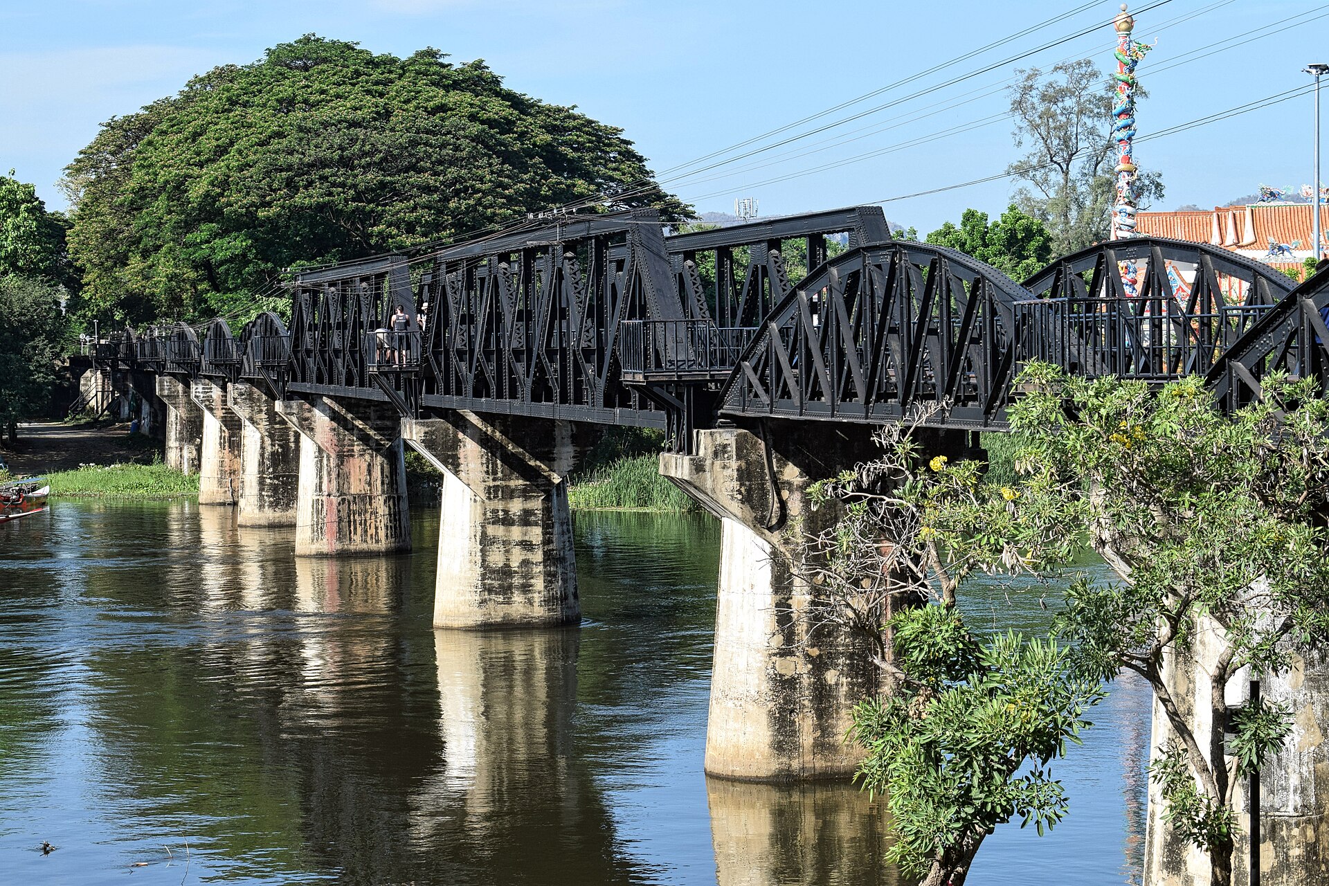 The iconic Bridge over the River Kwai, a symbol of resilience and history.