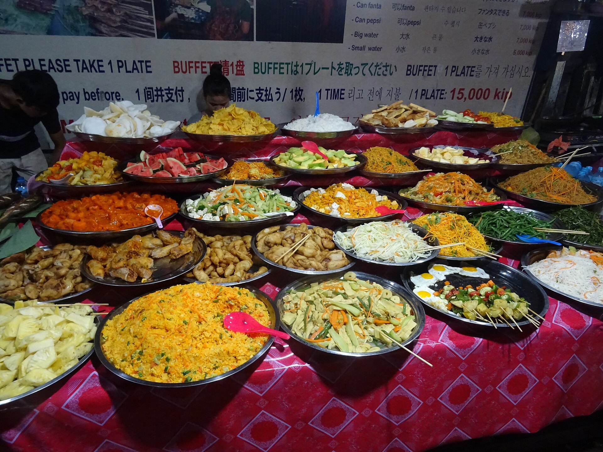 The vibrant night market of Luang Prabang, showcasing local crafts and delicious street food.