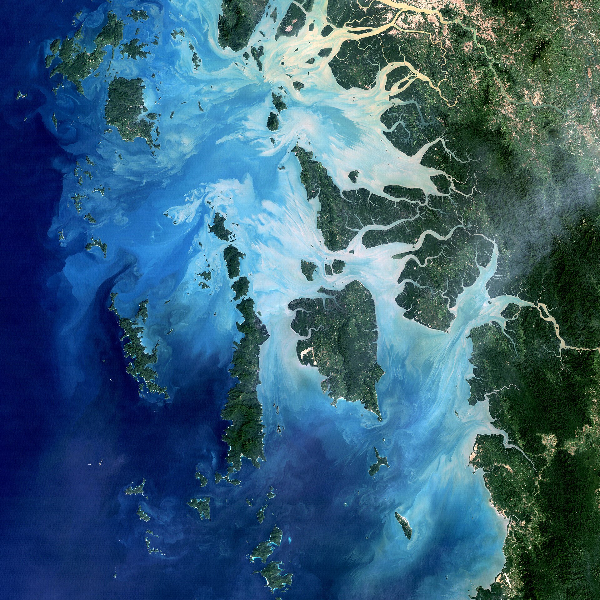 The vibrant coral reefs surrounding the islands, home to diverse marine life.