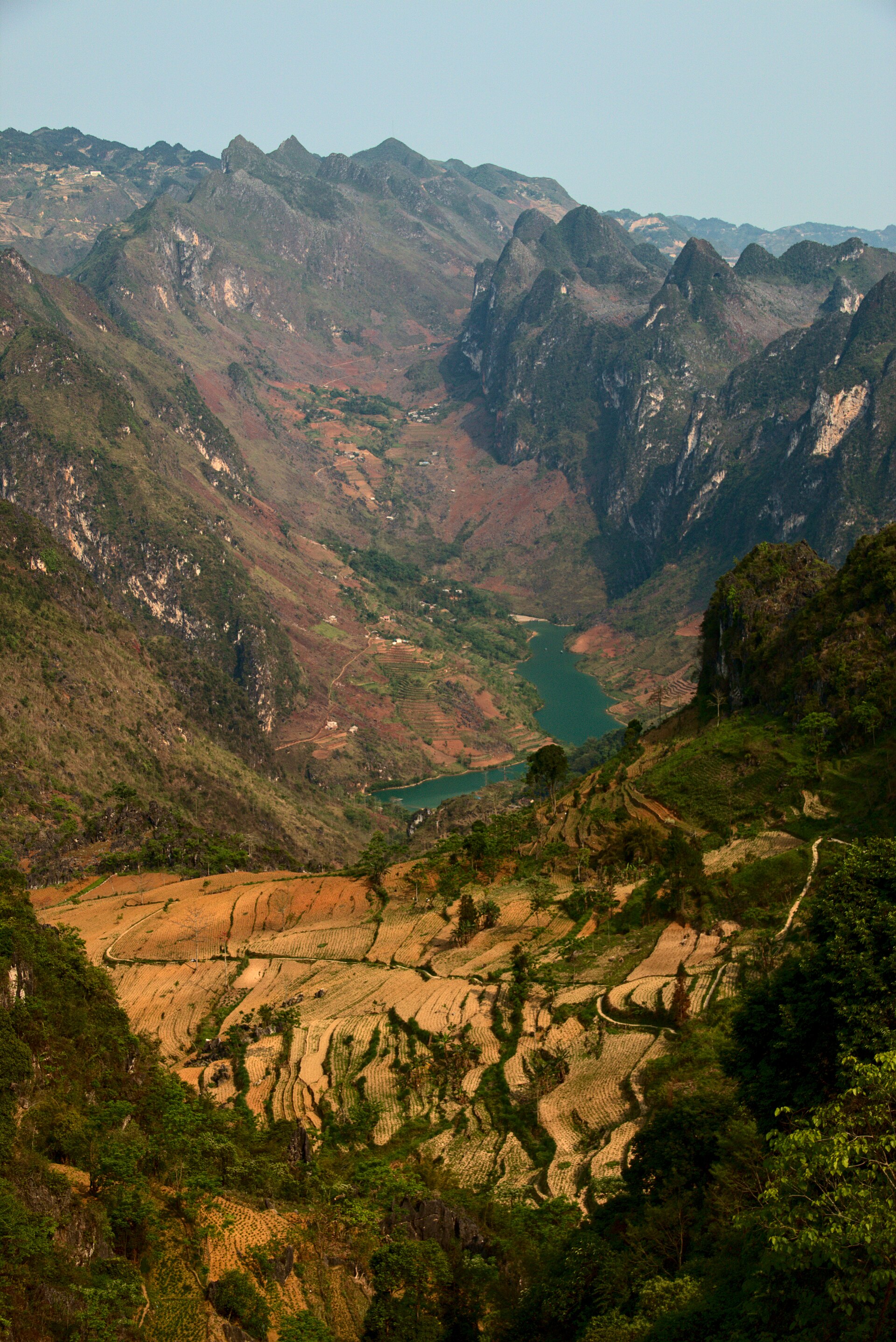 The stunning Dong Van Karst Plateau, a UNESCO site, showcases dramatic limestone formations.