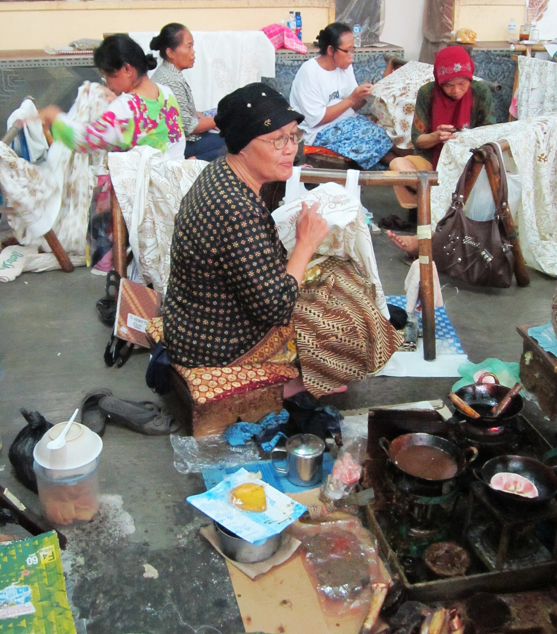 Witness the intricate art of batik making in local workshops.